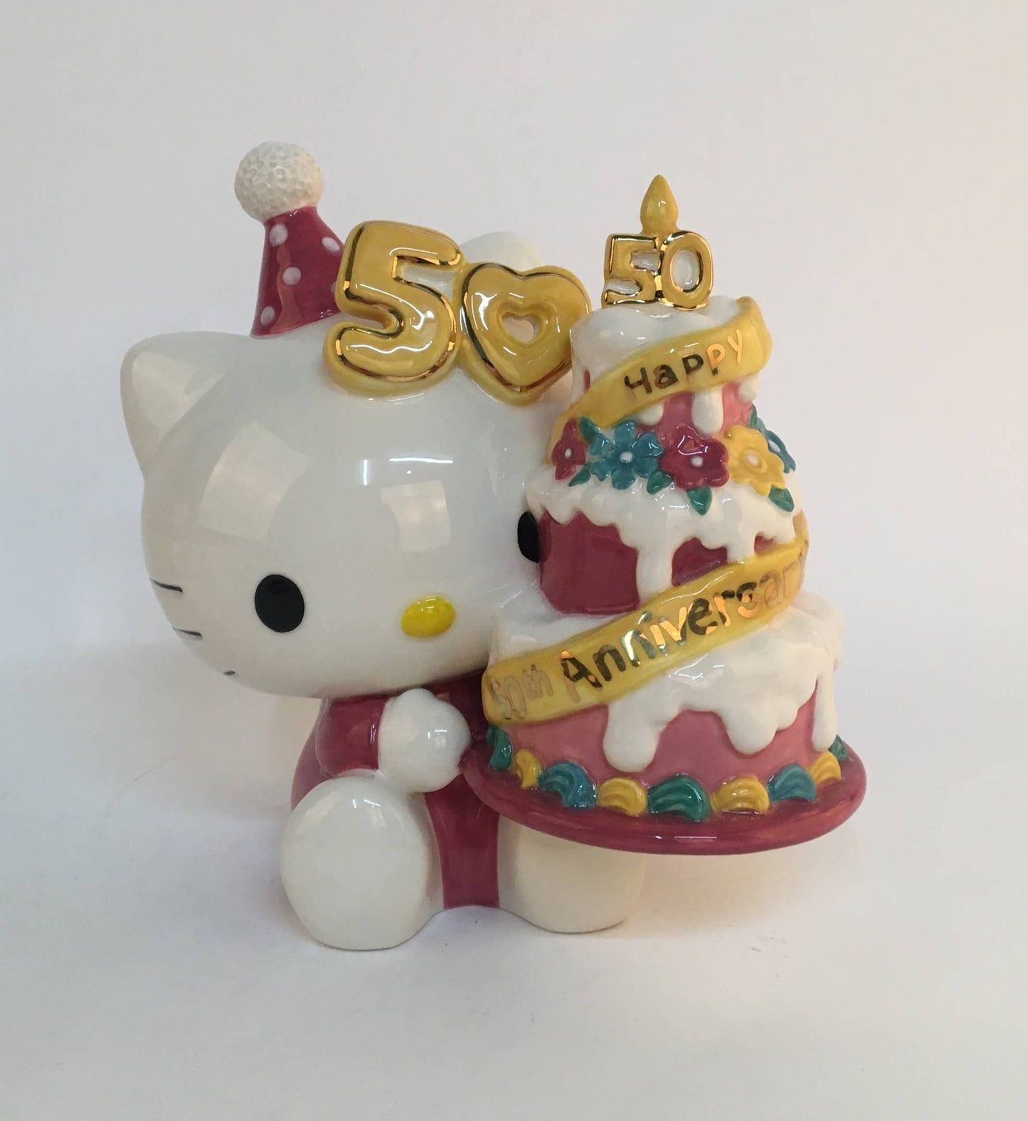 HELLO KITTY 50TH ANNIVERSARY HOLDING CAKE FIGURINE